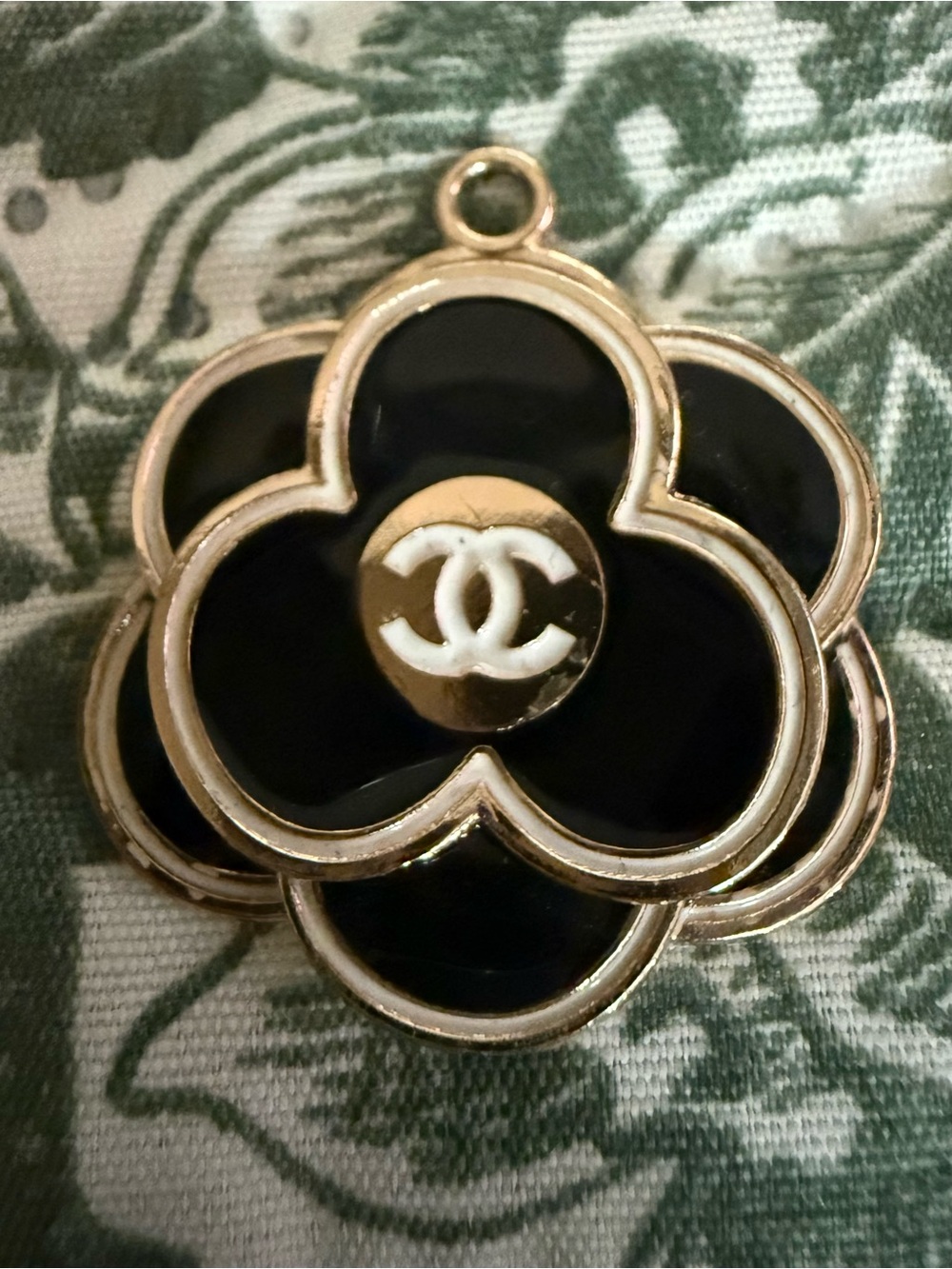 FASHION CHANEL Black and Gold Camellia Logo Pendant Charm.